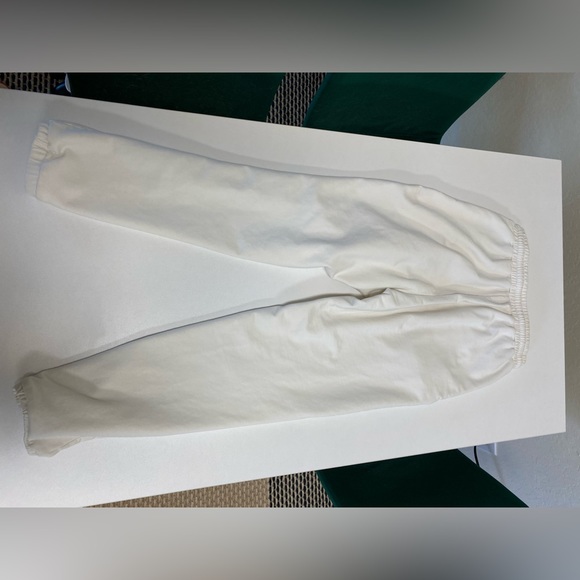 Meshki joggers with side pocket embroidery, drawstring, and pockets. Size xs. - Picture 3 of 5